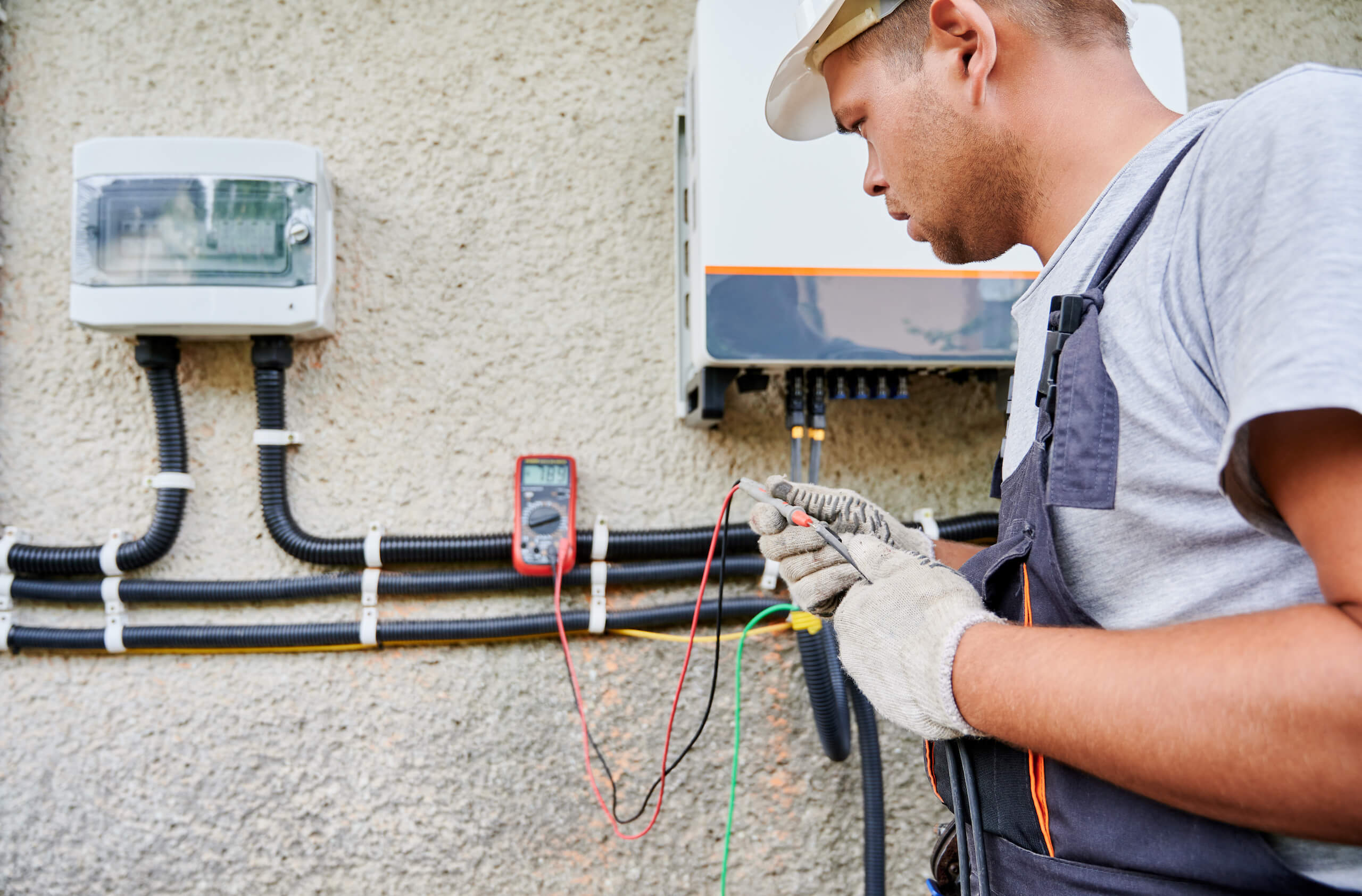 A solar inverter being installed on a home in Phoenix, AZ. A solar inverter being installed on a home in Phoenix, AZ.